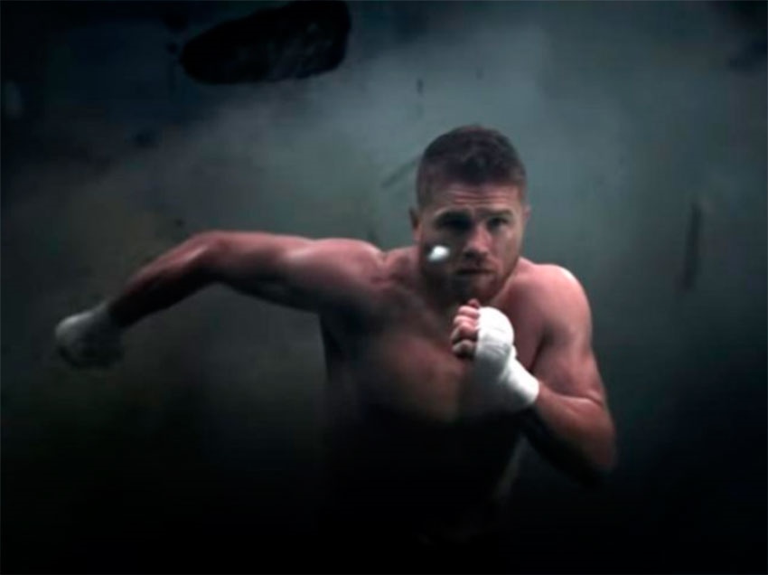 Promocionan pelea de Canelo y Chávez demoliendo muro de Trump